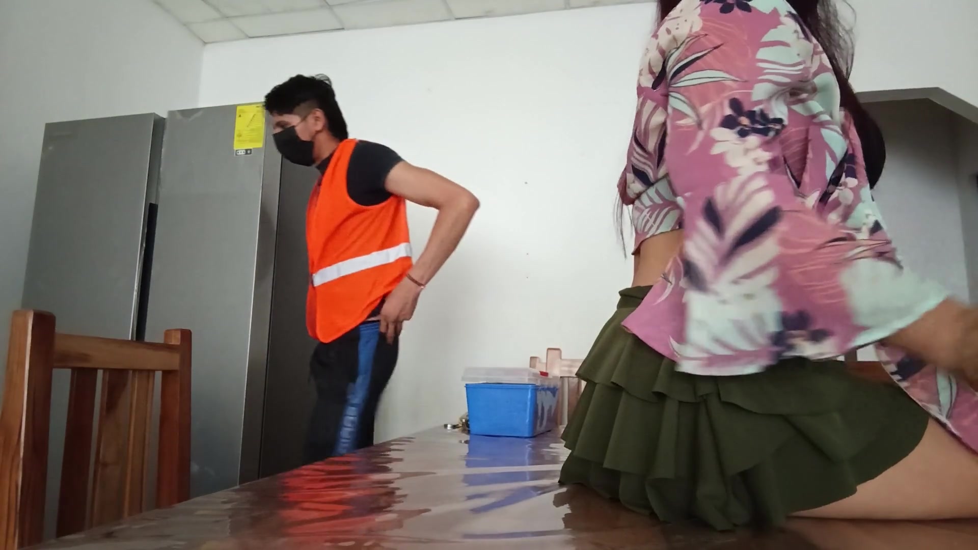 Cinderella shakes her buttocks on the table while the maintenance technician repairs the refrigerator
