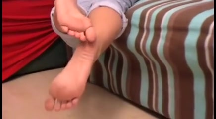 Melady's naked big feet in closeup