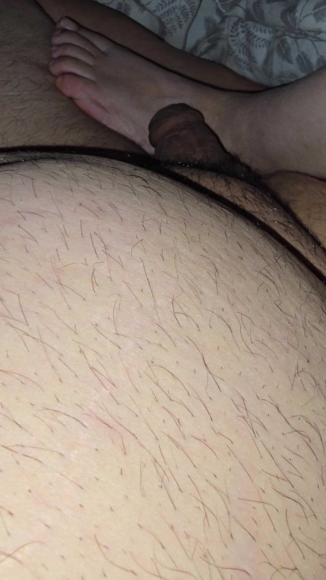 Step mom lets step son fuck her feet while sitting in bed