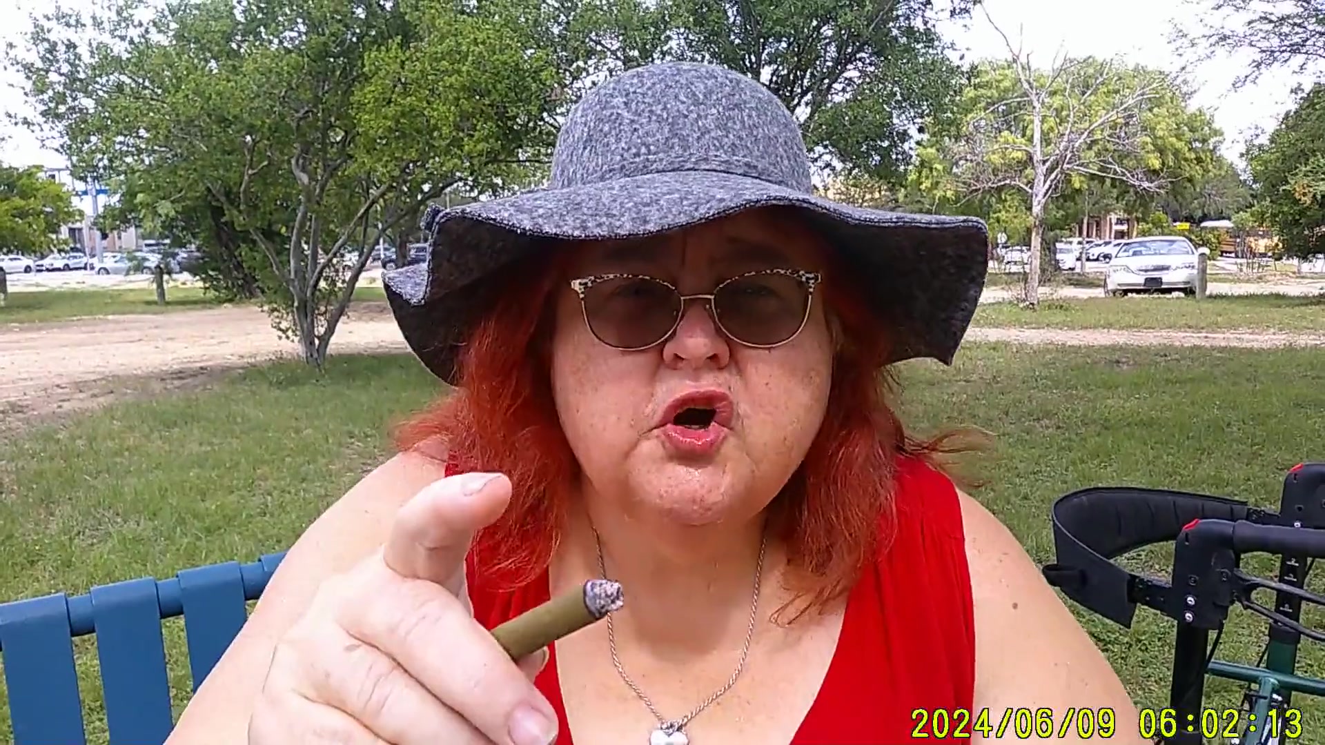 Nurse Vicki Smoking in the Park on a Bench All Dressed up