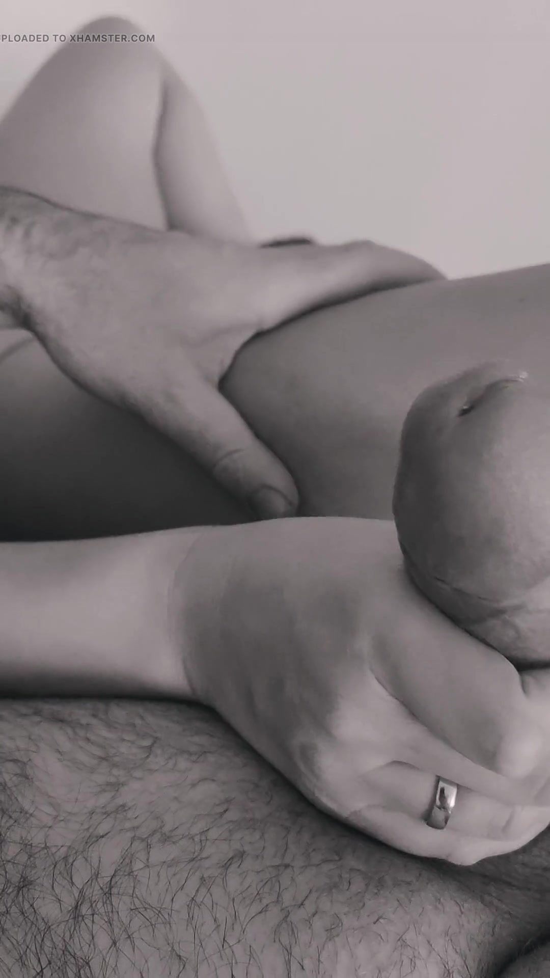 the lover plays with the penis