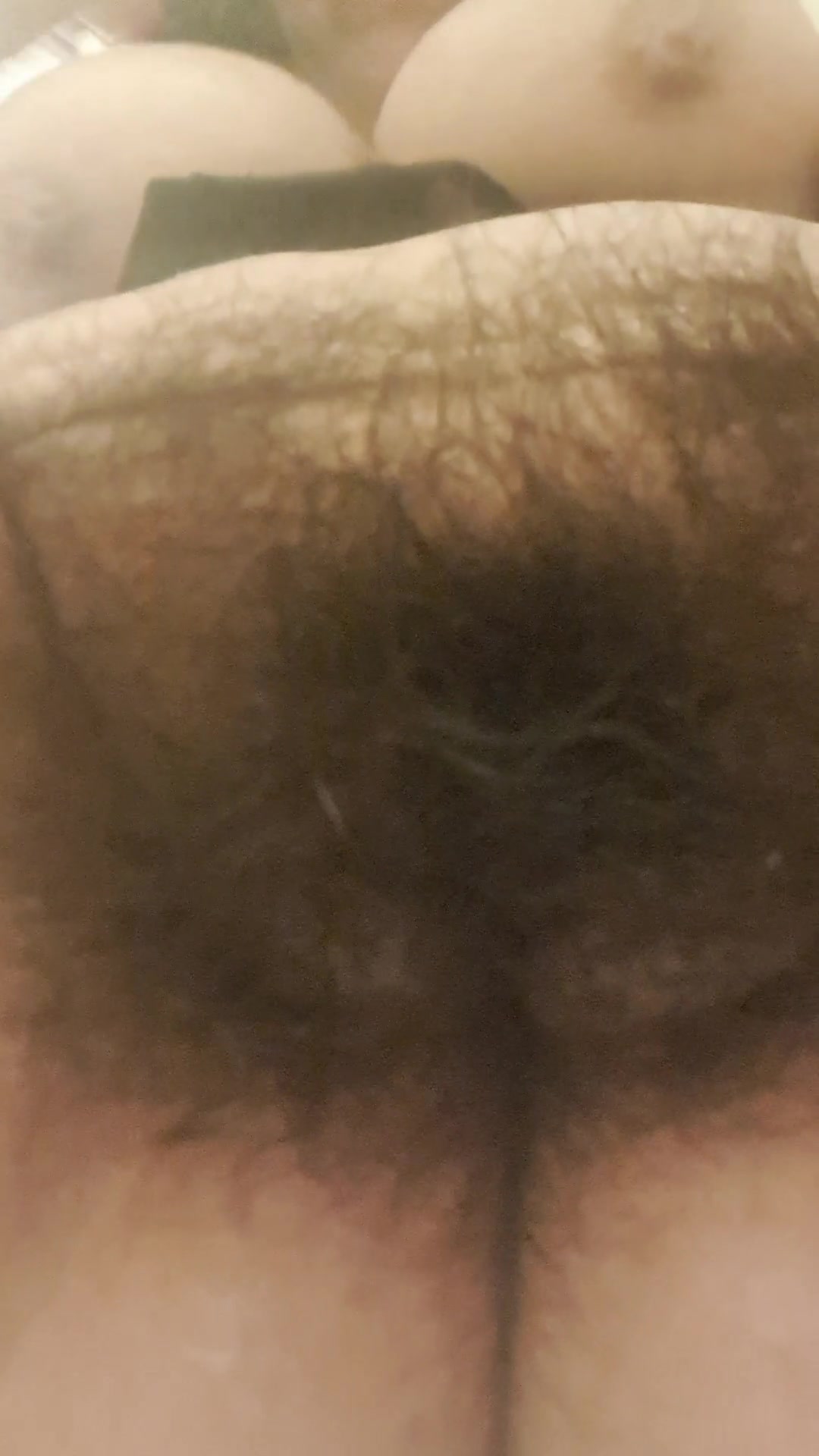 MILF in heat sucking her fingers from vaginal wetness