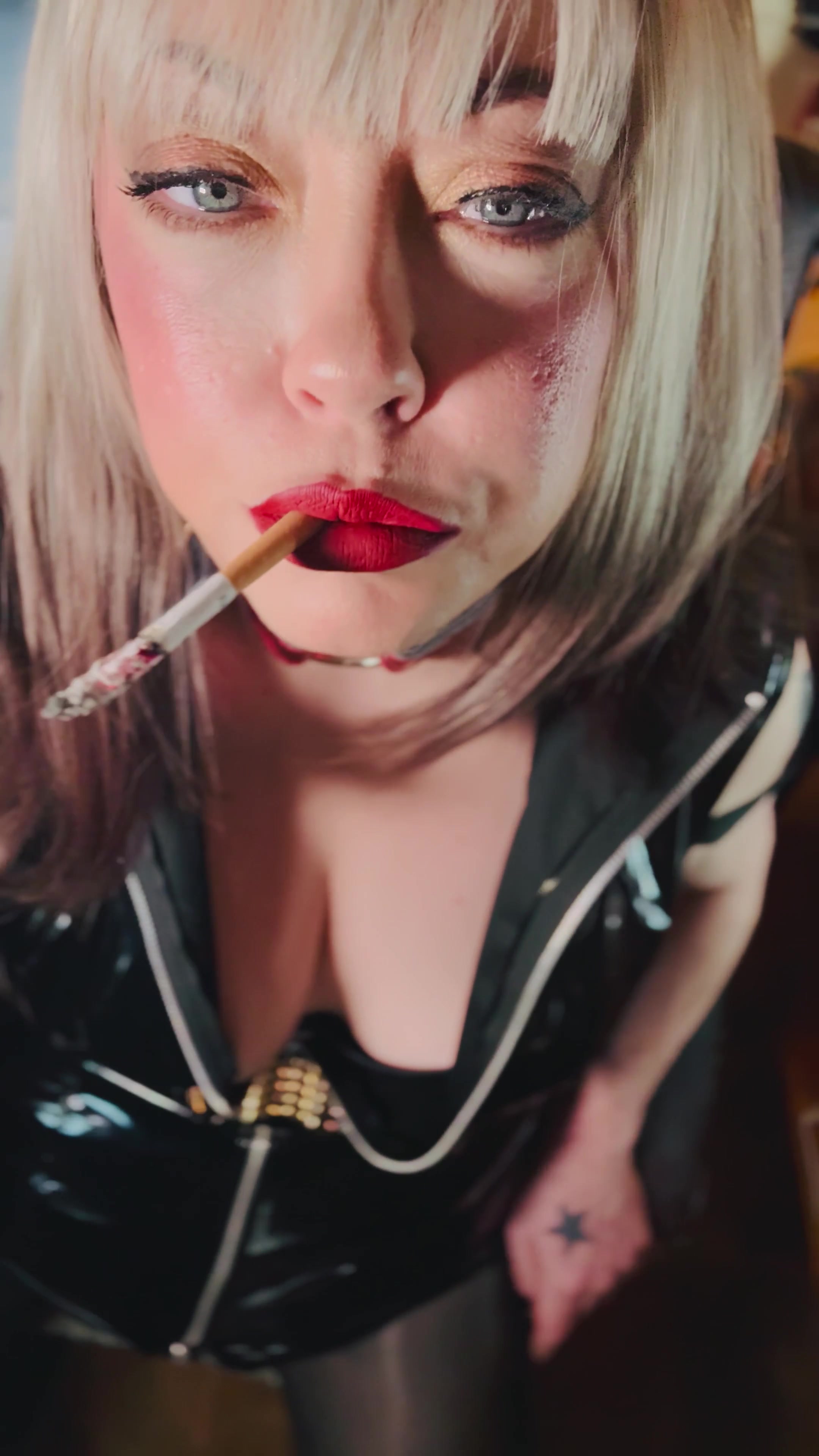 Miss Tina Snua Dressed In PVC & Smoking A Cork Cigarette With Lots Of Dangling, Snap Inhales, OMI & OME