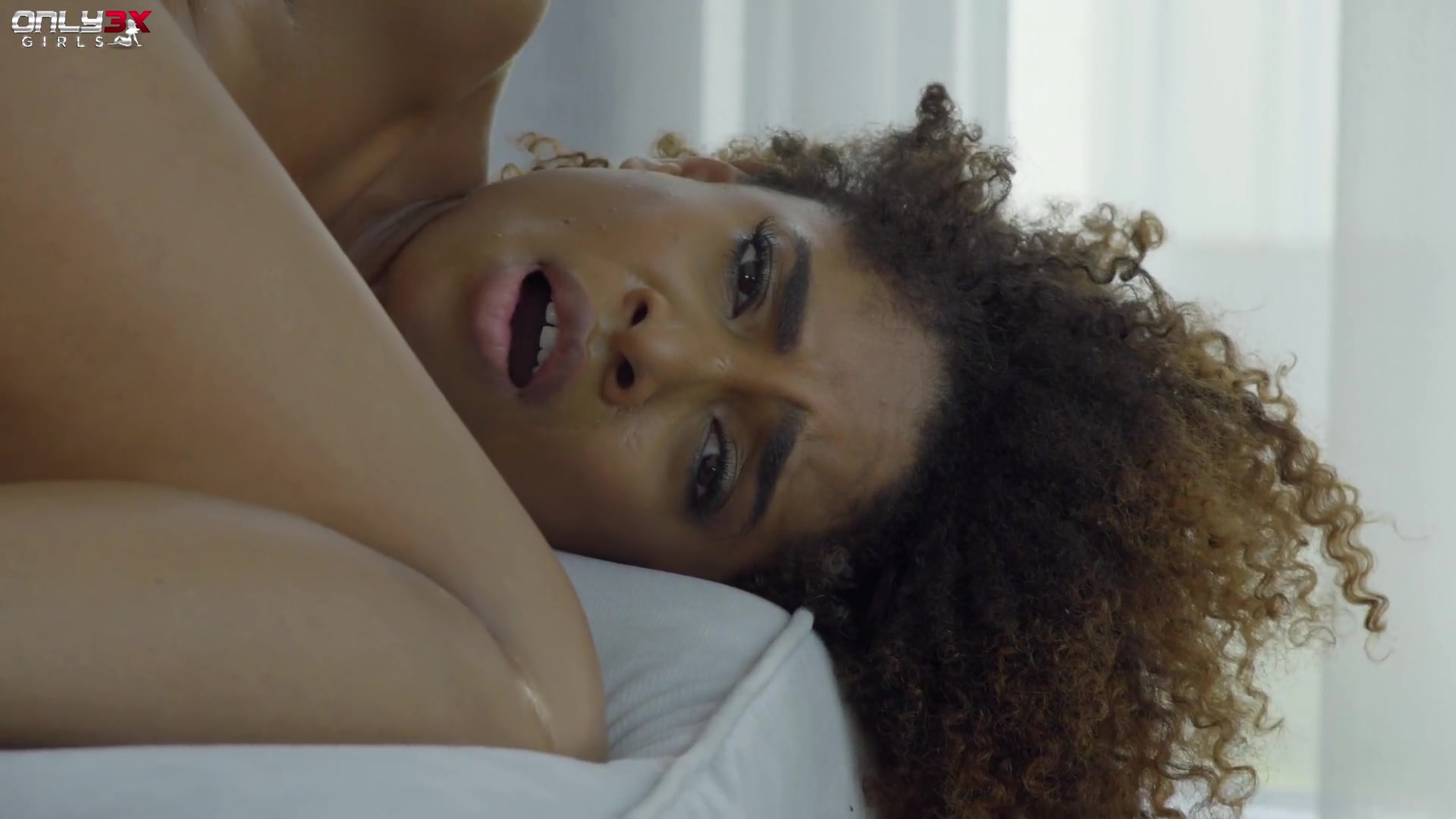 Curly-haired ebony Luna Corazon trembling on her orgasms