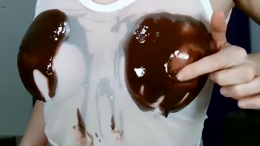 Wetting boobs, tities and nipples with chocolate