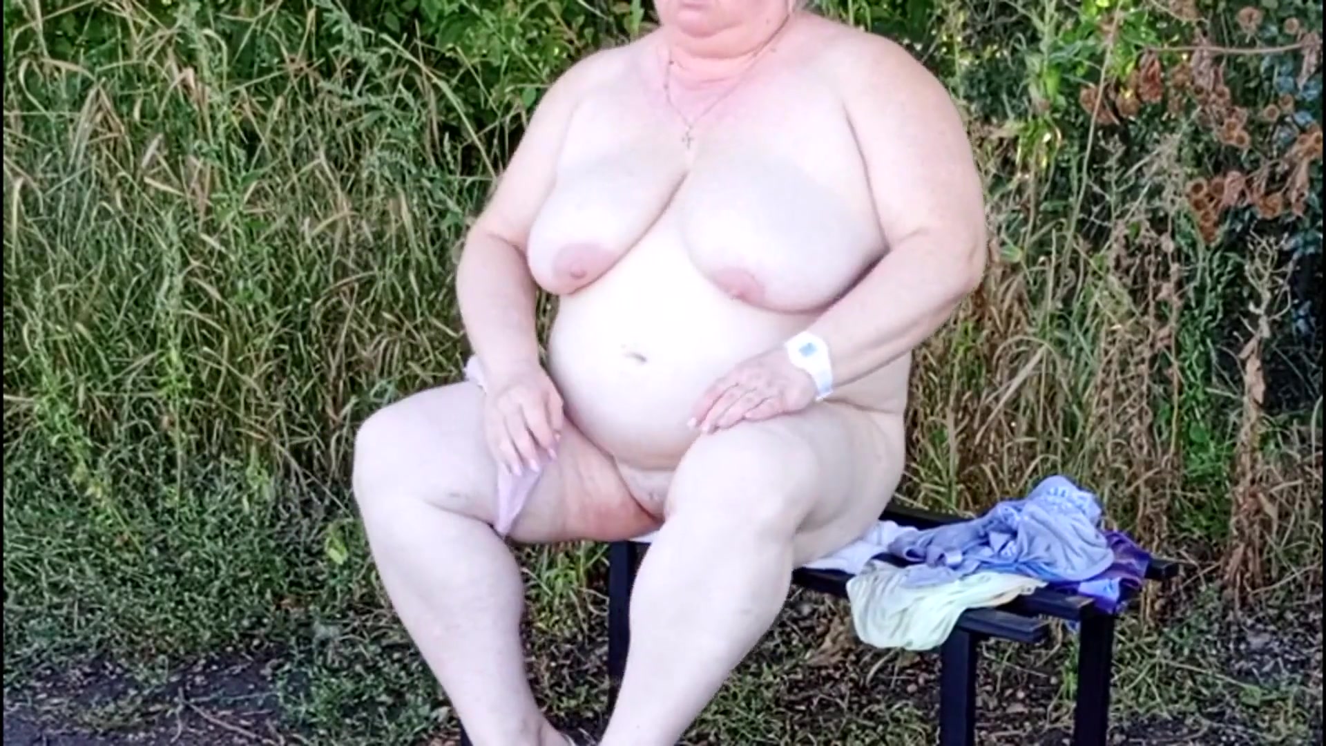 Stepmom in the Park Undressing and Masturbating on a Bench